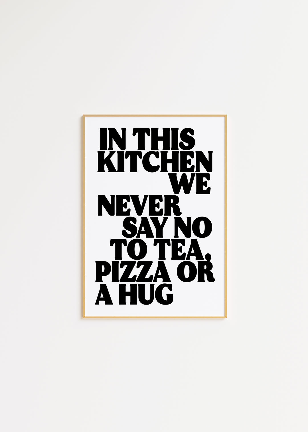 In This Kitchen We Never Say No To Tea, Pizza or a Hug in Black Print A3