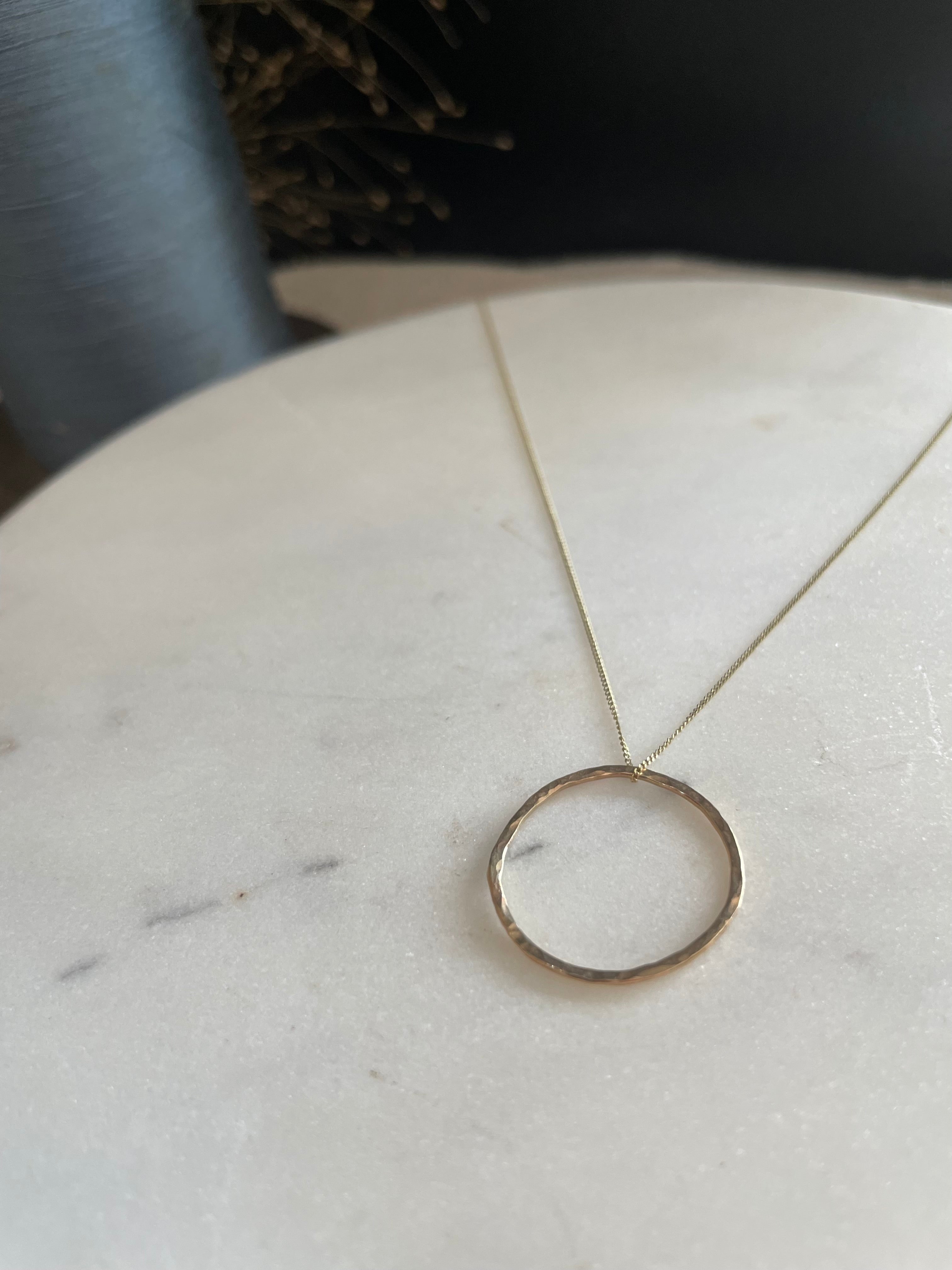 Gold eternity circle - 9 ct hammered on 45cm gold chain