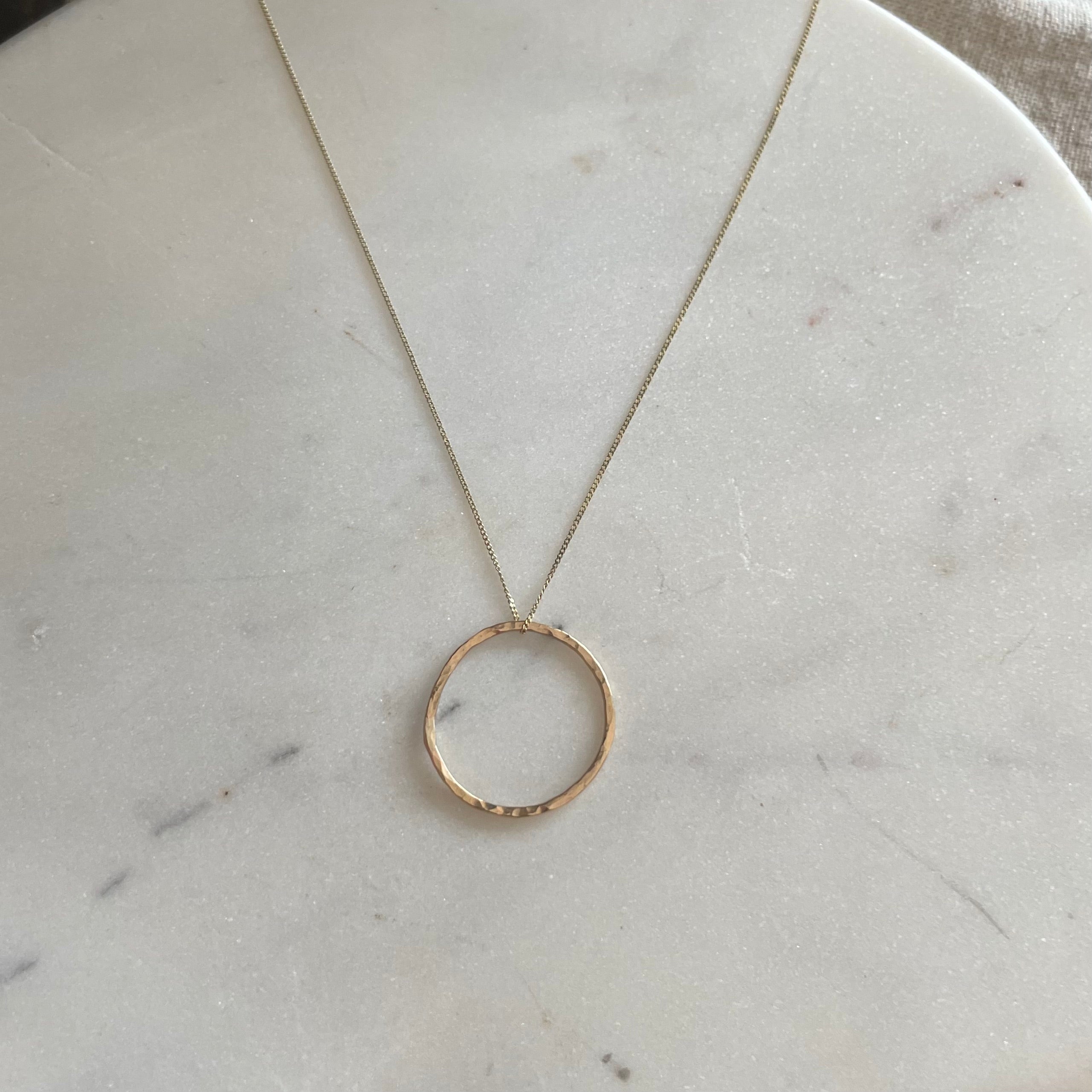Gold eternity circle - 9 ct hammered on 45cm gold chain