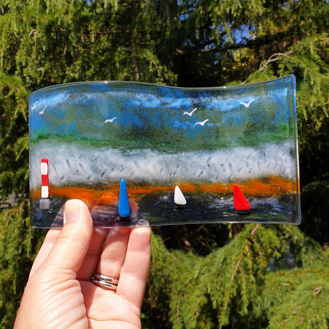 Freestanding Fused Glass Wave Showing Sussex Coastline and Lighthouse