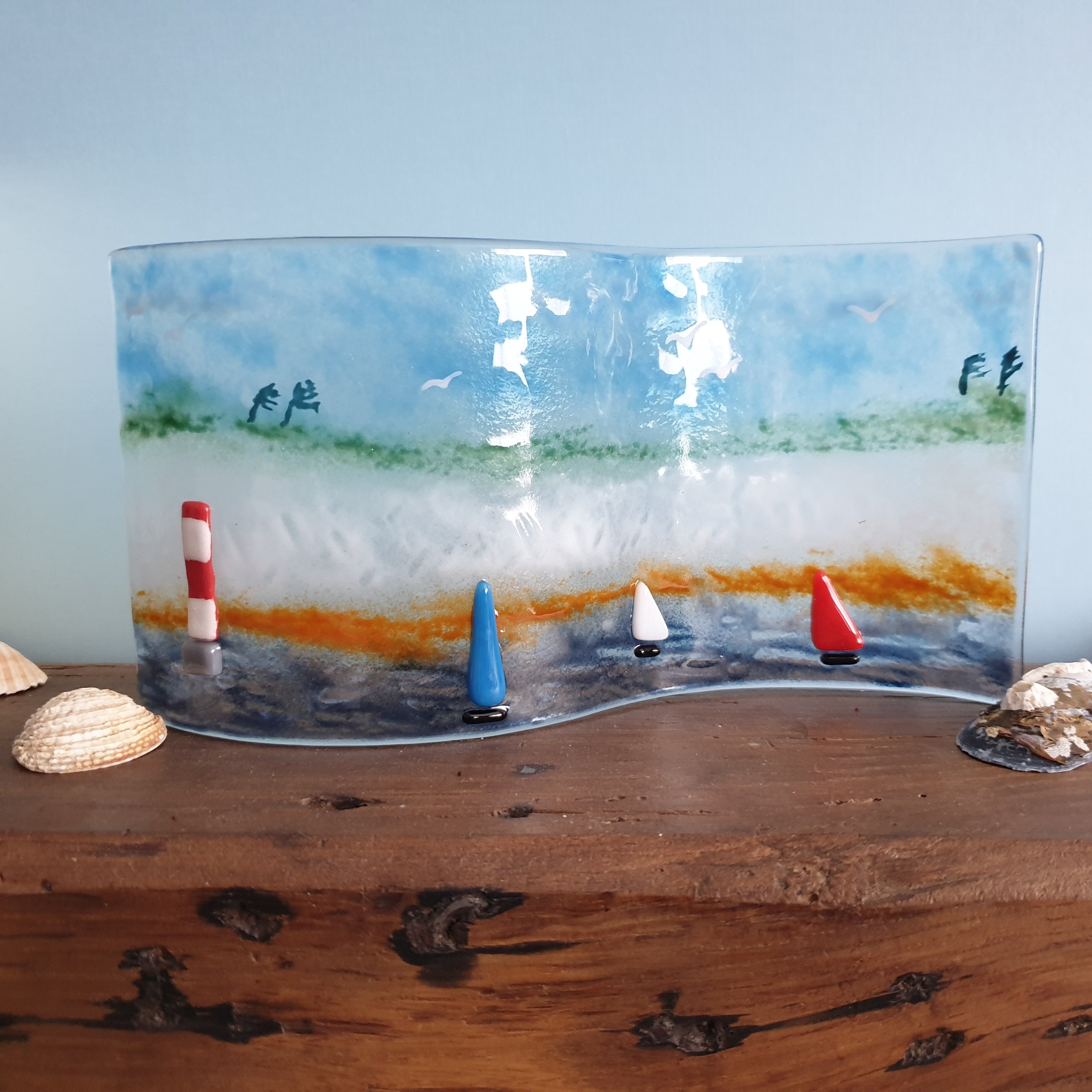 Freestanding Fused Glass Wave Showing Sussex Coastline and Lighthouse