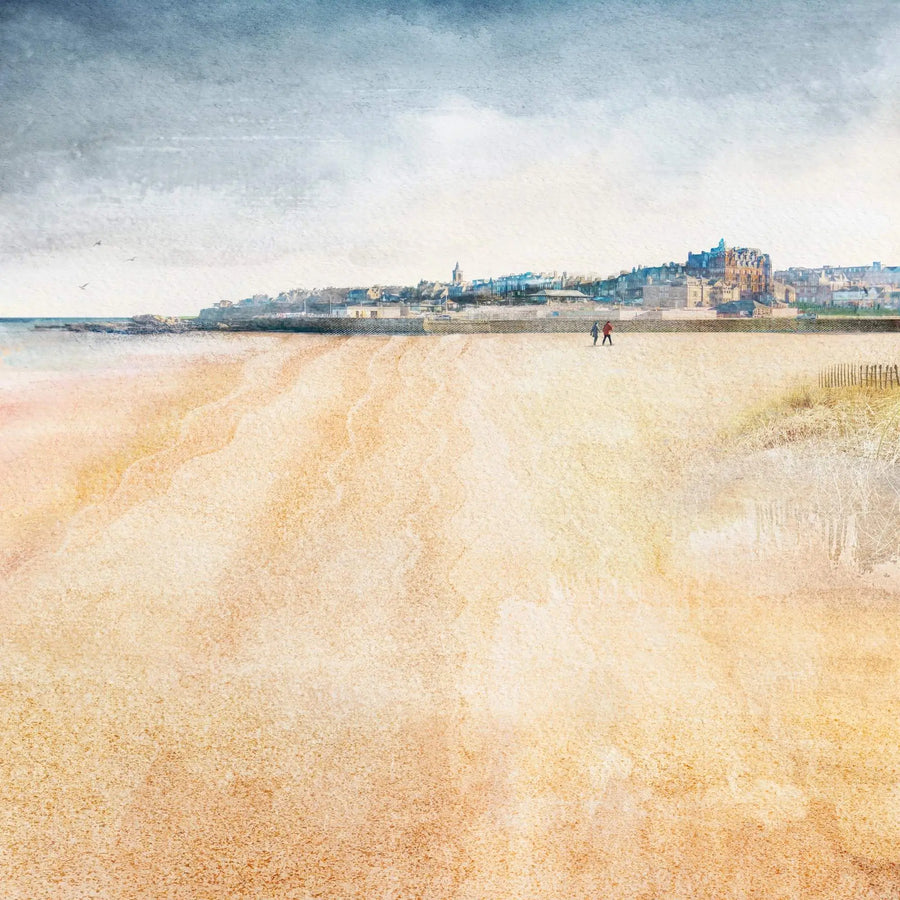 West Sands, St Andrews picture. The top 1/3 of the picture is the town shown as a view from the beach. The bottom part of the image is the beach. The sky is a muted blue grey. Overall the artwork is calming. There are 2 people walking in the distance on the beach